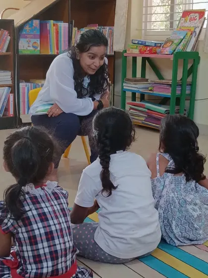 A close up interaction between the storyteller and the children, creating a personal connection.