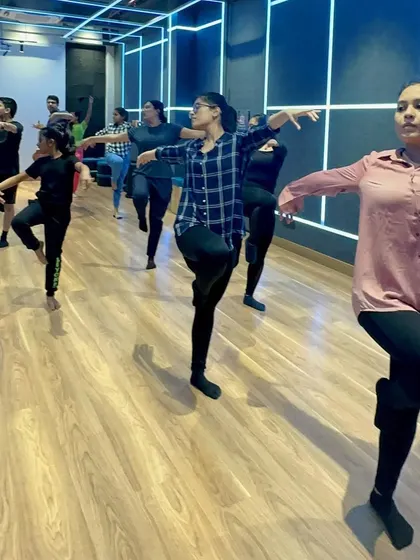 Photos from a contemporary and jazz workshop, showing a diverse group of students learning together. My classes are a great way to meet people and be part of a community.