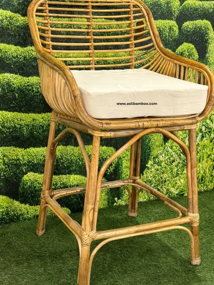 This close-up of our rattan bar chair highlights the detailed craftsmanship and the smooth, sturdy finish of the bamboo frame. Designed for both comfort and durability, it's a popular choice for commercial hospitality clients looking for stylish, long-lasting furniture.
