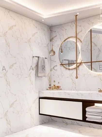 A luxurious bathroom concept in all-white marble with gold accents, featuring a floating vanity, dual circular mirrors, and elegant pendant lighting.