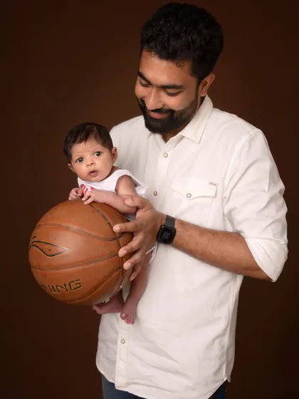 From the basketball court to his heart. This father dreamt of this moment, and we captured it. I love personalizing sessions to tell your unique family story, creating a legacy in motion.