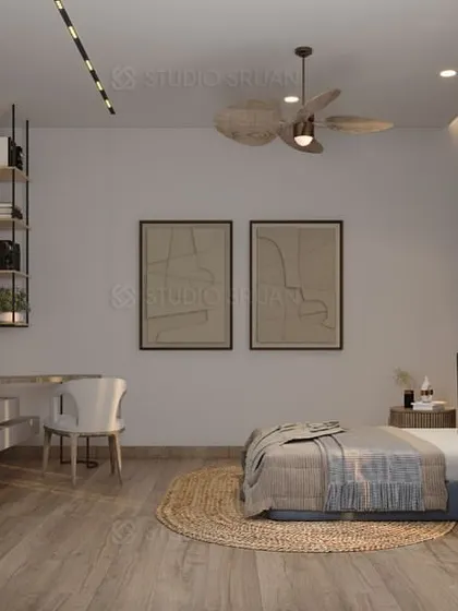 This view shows the functional layout of the rustic-themed bedroom, including a floating vanity and desk area.