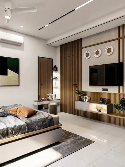 This bedroom design combines functionality and style with a stunning TV wall unit featuring wooden fluting and integrated shelving. The room also includes a dedicated vanity corner, showcasing our ability to create multi-functional spaces.
