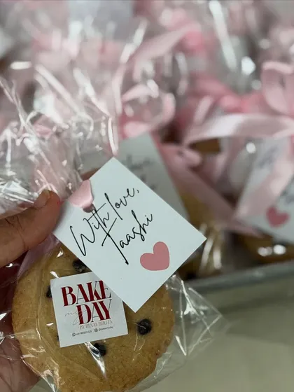 A close-up of a personalized cookie favor. I can add custom tags for any occasion, from birthdays to bridal showers.