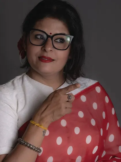 Adding a pair of glasses to the retro look for a quirky, intellectual twist. I love experimenting with accessories to change the feel of an outfit.