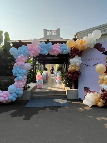 Another view of the grand entrance decor for the horse-themed celebration, showcasing the full balloon arch and personalized welcome sign.