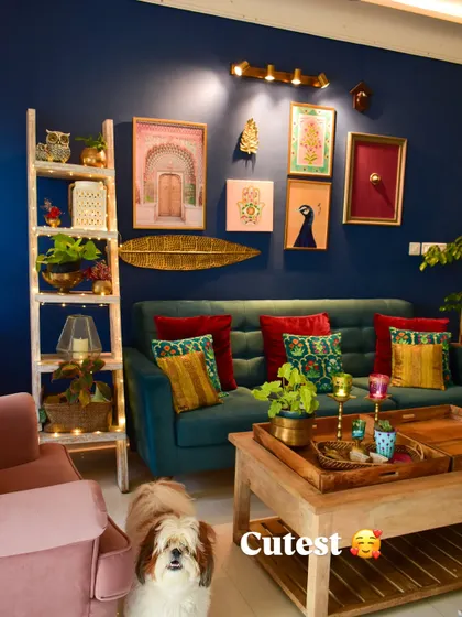 Here is my cutest little model posing in front of our gallery wall. I love mixing different art styles and objects to create a wall that tells a story and reflects our passions.