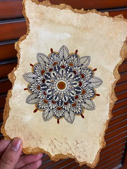 Yes, you can paint with coffee! I used coffee to create the warm, earthy tones in this unique mandala, drawn on rustic, hand-torn watercolor paper for an antique feel.