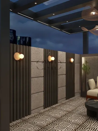 This Noida penthouse terrace is a boho-chic sanctuary in the sky, featuring rustic digital-print tiles and comfortable outdoor seating.