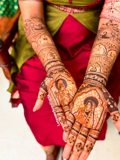 Another perspective of the Radha-Krishna themed bridal mehendi, highlighting the storytelling elements woven into the design.