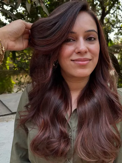 A portrait of the client with her new 'Rose Gold' hair.