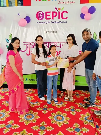 Celebrating the achievements of our students is a key part of our summer camp finale. Here, we are presenting an award to a deserving participant at our 'Jashn-e-bachpan' event.