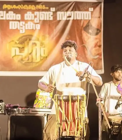 Another angle of my Chenda artists, showcasing their performance from the crowd's perspective.
