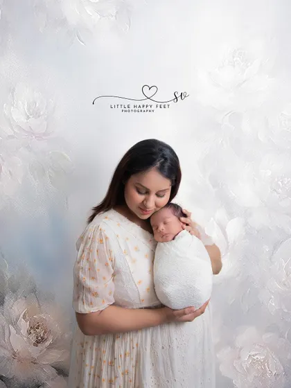 A mother's first embrace. There is a unique tenderness in the way a new mother holds her baby, and I aim to capture that pure, unconditional love.