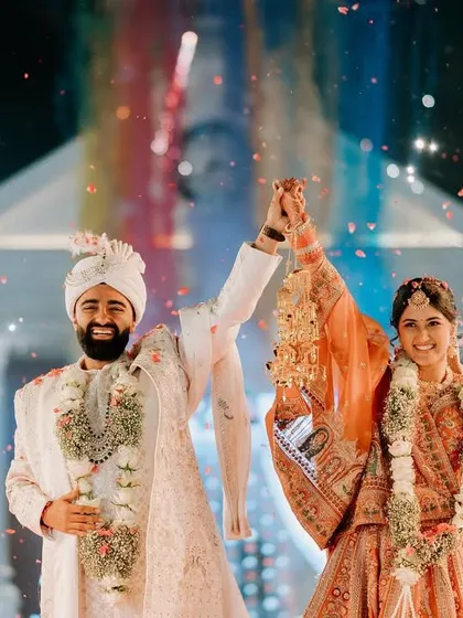 A triumphant moment with fireworks and sparklers. This high-energy shot captures the peak of the celebration, creating a truly spectacular memory.