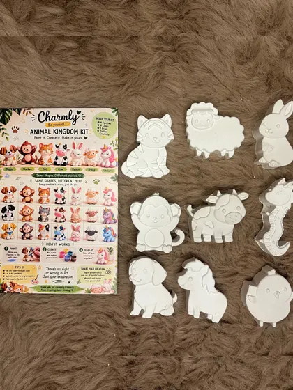 Here is a closer look at the Animal Kingdom kit. It comes with a variety of unpainted animal figurines, including a tiger, sheep, monkey, and cow, all ready for you to bring to life with your own designs.