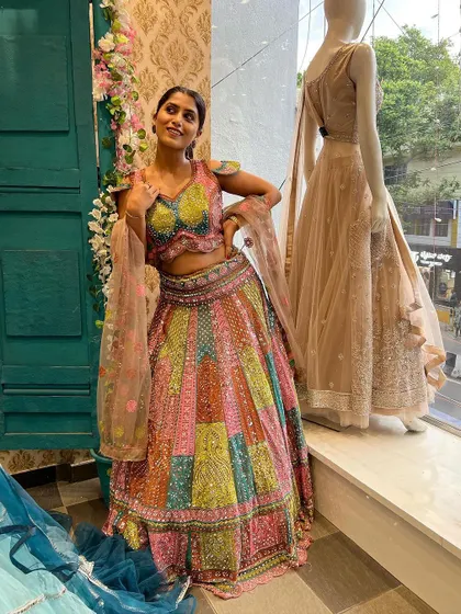 Actress Chandna Gowda looks stunning in our exclusive multi-color panelled lehenga. The intricate handwork on the blouse perfectly complements the vibrant skirt.