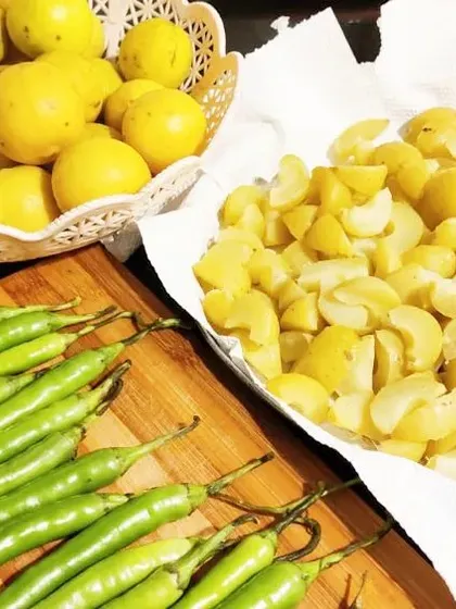 Fresh ingredients for our healthy mixed pickle: amla (Indian gooseberry), lemon, and green chillies. All are known for their health benefits.