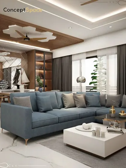This living room design balances comfort and style with a large L-shaped sofa, a unique ceiling detail above the fan, and a clear view into the adjoining dining area, creating an open and connected living space.
