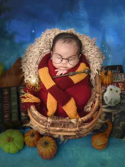 Another angle of our enchanting Harry Potter theme. This little wizard is swaddled in Gryffindor colors, ready for his first year at Hogwarts.