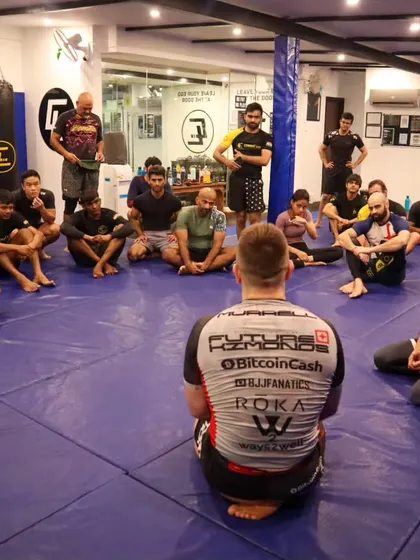 Coach Mike Murrell explaining a concept to the group. These sessions are interactive, with plenty of opportunities to ask questions and understand the theory behind the techniques.