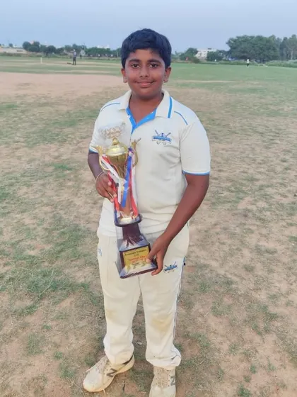 Shourya Kangne proudly holds his trophy for Best Batter after smashing a century in the finals of the U-13 Eventistic Ventures Cup.