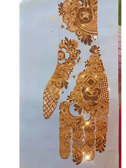 Another angle of the sparkling sider henna design. This type of detailed practice is essential for any aspiring bridal henna artist.