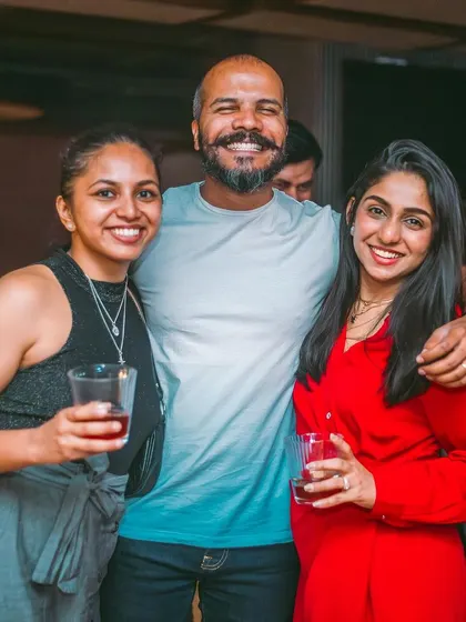 A group of friends enjoying drinks together.