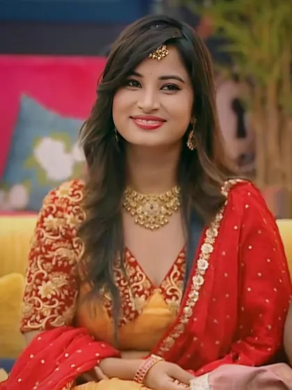 The complete look of Anusha Rai for Bigg Boss Kannada, featuring our traditional gold-finish jewellery.
