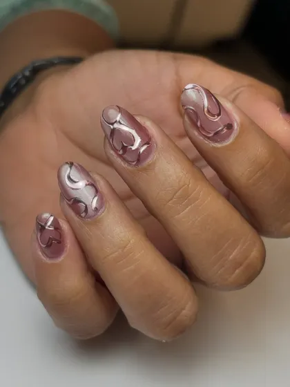 The full set of the magnetic heart chrome nails. It's a romantic design with a modern, edgy twist.