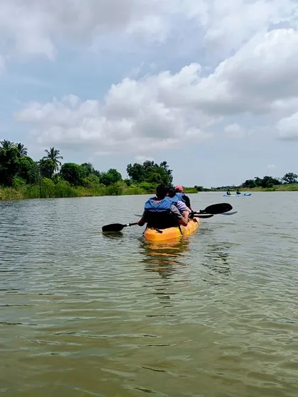Kayaking on a serene lake near Bangalore. I include water activities in many of my day outings for a refreshing experience.
