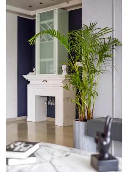 The fireplace-inspired bar unit, seen from the living room sofa. It's a perfect example of how we integrate functional pieces into the design in a way that is both beautiful and unexpected.