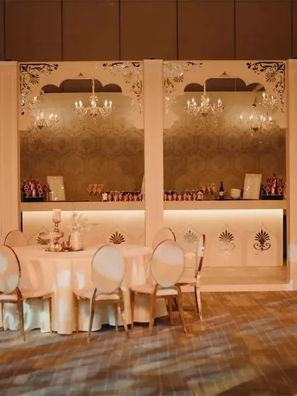 This was more than just a bar; it was an imperial experience. We designed a grand, walk-in bar that became a central feature of the event, framed by regal arches and elegant chandeliers.