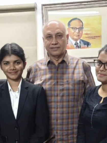 With two dedicated interns in my office, with a portrait of Dr. B.R. Ambedkar in the background. His vision of social equality is a constant inspiration for my legal work and activism.