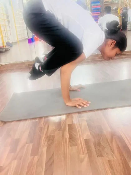 Another one of our dedicated members mastering the Crow Pose. We guide you step by step to help you achieve advanced postures like this.