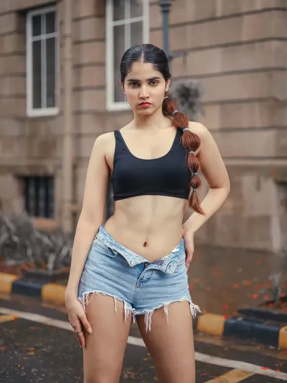 A strong, direct-to-camera pose that exudes confidence.