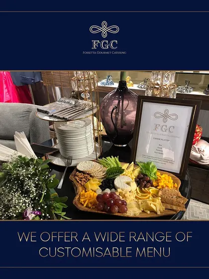 This image highlights our customizable menu options, featuring a cheese and fruit platter next to a stack of plates. It communicates that we offer a wide range of choices to suit any event.