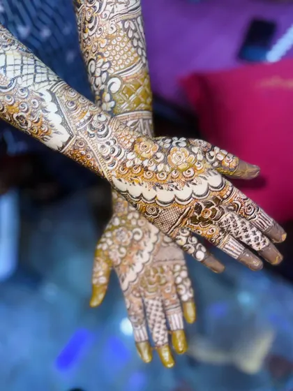 A close-up of the bridal henna, showing the intricate details and the beautiful stain.