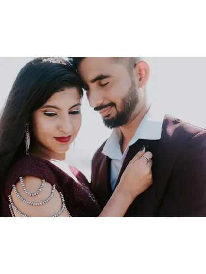 A cropped version of image 280, focusing on the couple's embrace.