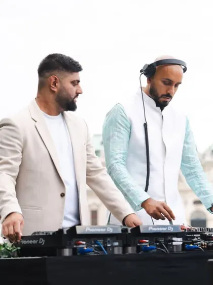 A shot with my DJ partner Itch in Vienna. August was a whirlwind of destination weddings, UK gigs, and family time.