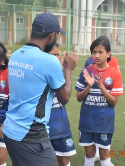 A coach motivating the U-15 girls' team during the Khelo India League. The first step is always the most important, and they took it with courage.