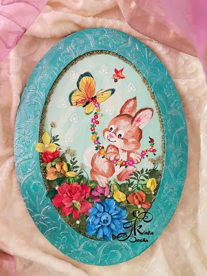 A throwback to an older piece I still love. This oval panel features a cute bunny playing with a butterfly, surrounded by a garden of colorful flowers. It’s a perfect example of my whimsical style.