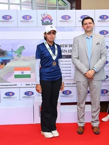 Smira Bhambri stands on the winner's podium after her Runner-Up finish at the US Kids Golf India tournament, held at the Classic Golf and Country Club.