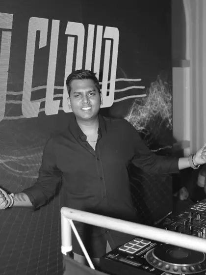 A black and white photo from a New Year's event, capturing a moment of pure enjoyment.