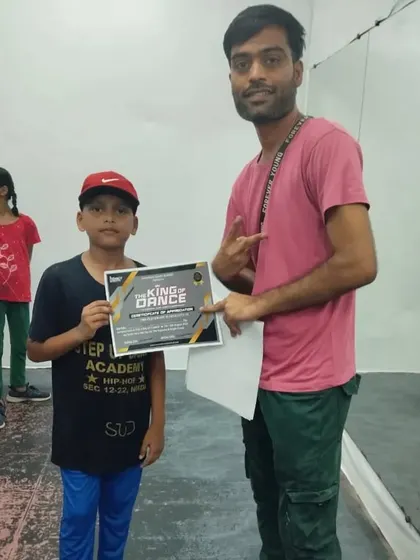 Handing out the competition prize. This young boy's dedication is truly inspiring.