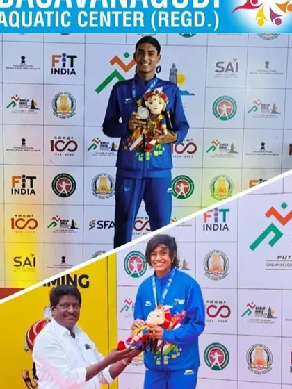 Dharshan S and Meenakshi Menon with their silver medals.