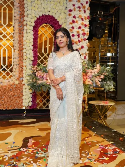 A full-length shot of the client at the event.