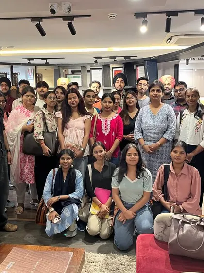 A group photo of our students and faculty inside the Merino Experience Centre, after an insightful session on modern interior materials.