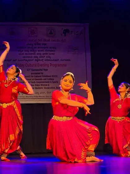 Three dancers in perfect harmony during our performance at Bharatiya Vidya Bhavan. This pose showcases the geometric beauty and precision of Bharatanatyam.