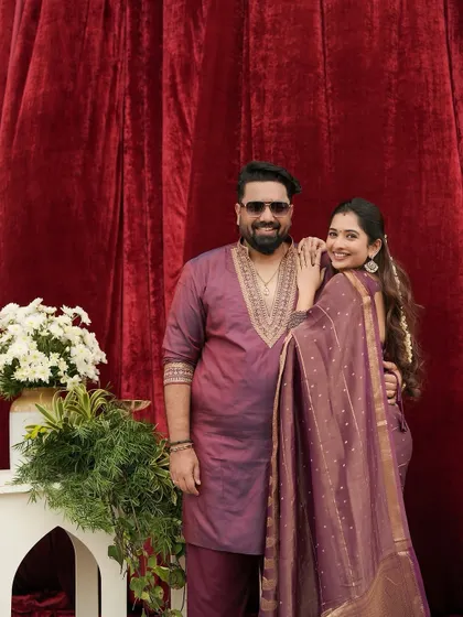 Another lovely shot from the anniversary photoshoot. It shows how their complementary outfits create a picture-perfect, harmonious look.